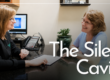 Doctor and patient smiling having a conversation